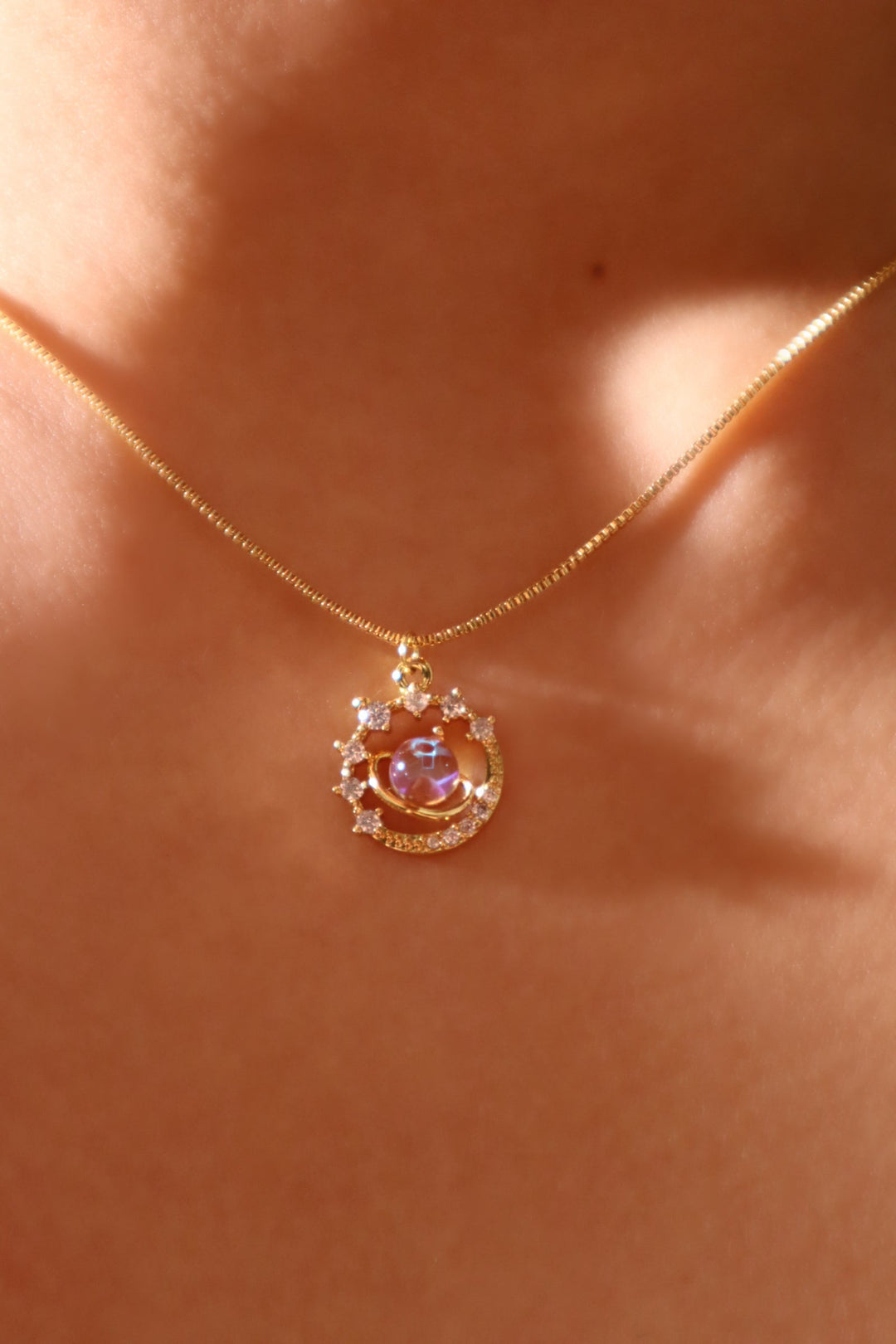 Collana con stella di Saturno e pietra di luna