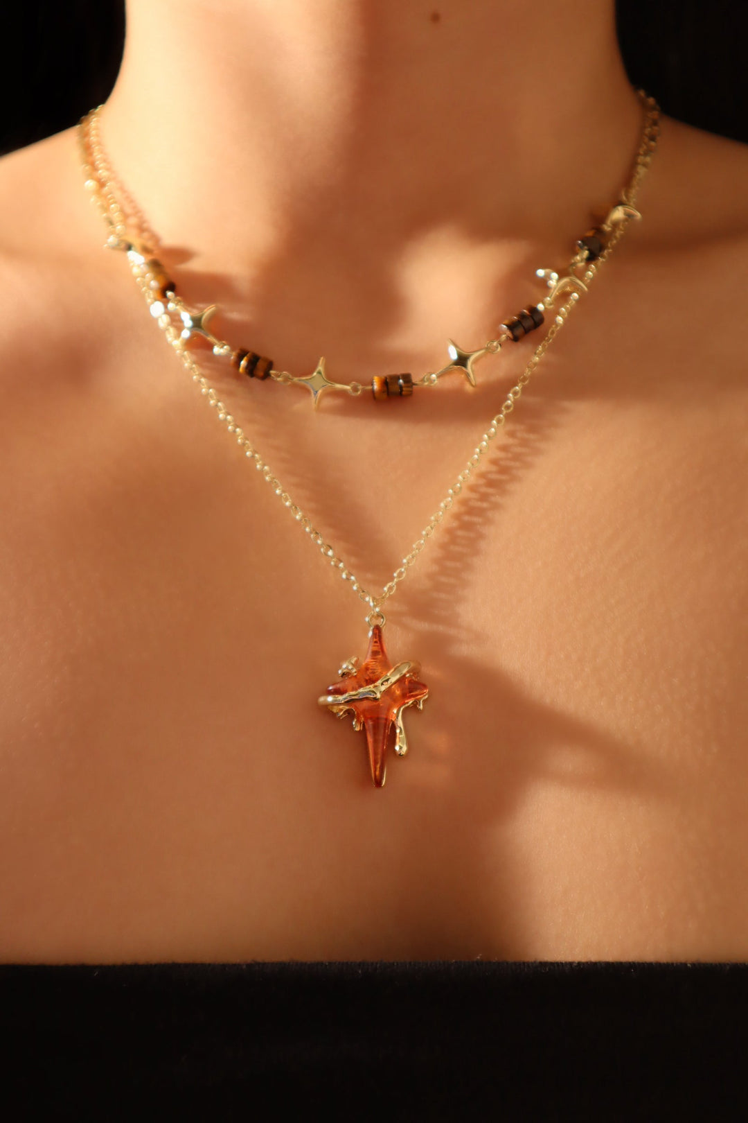 Collana con stella marrone Tigerite
