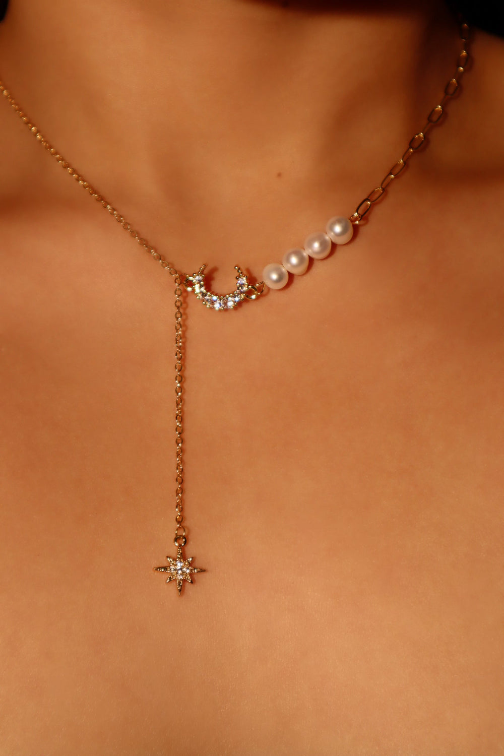 Collana di perle, luna e stella