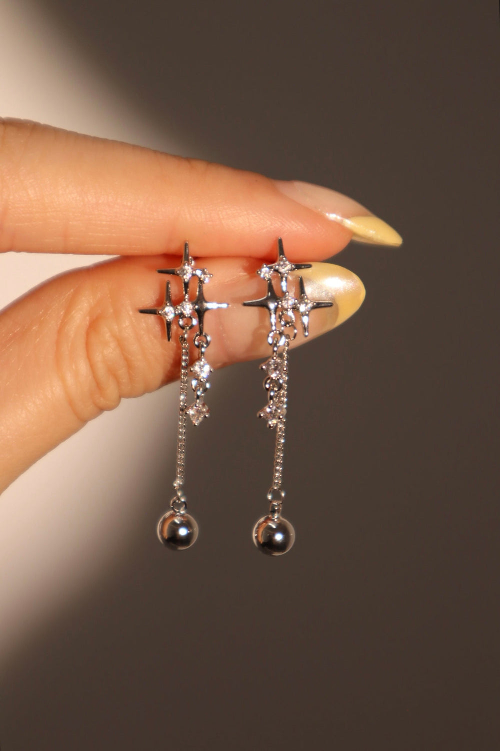 Orecchini a stella con diamanti 3 in 1