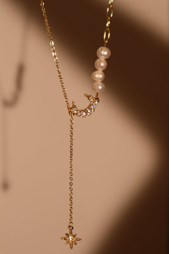 Collana di perle, luna e stella