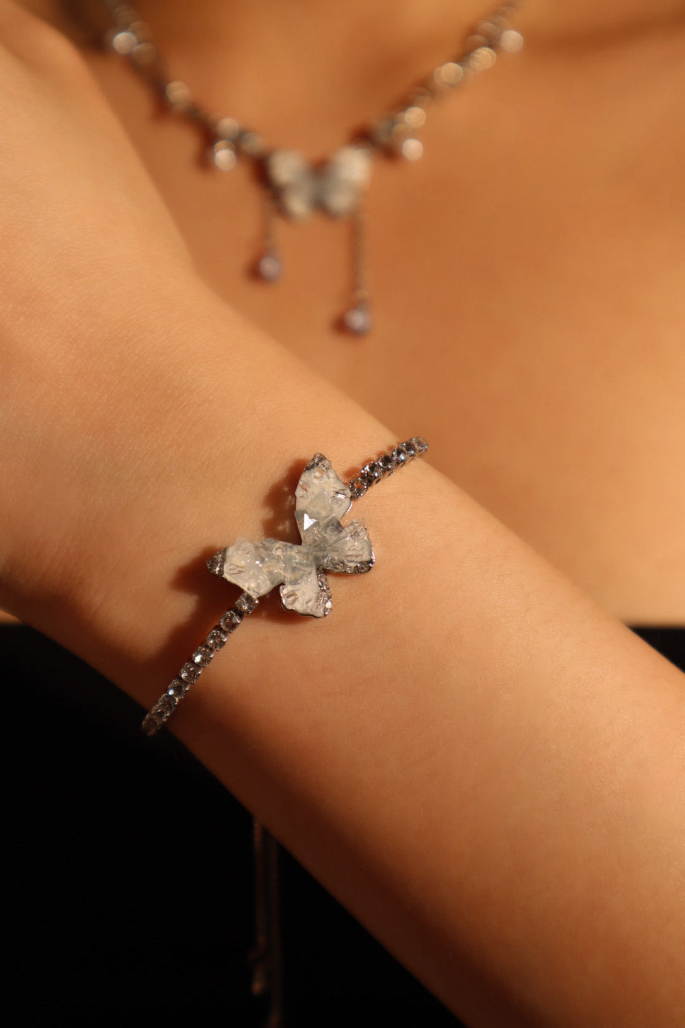 Bracciale con farfalla in cristallo blu
