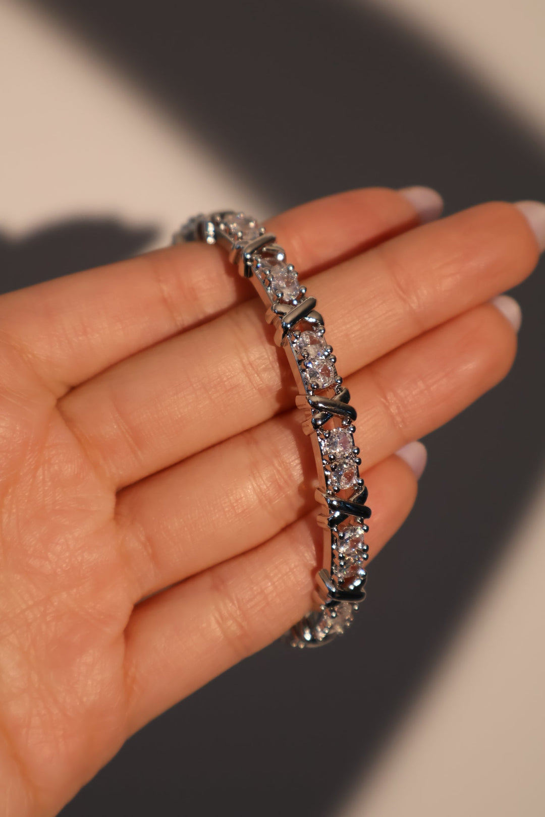 Bracciale con croce di diamanti