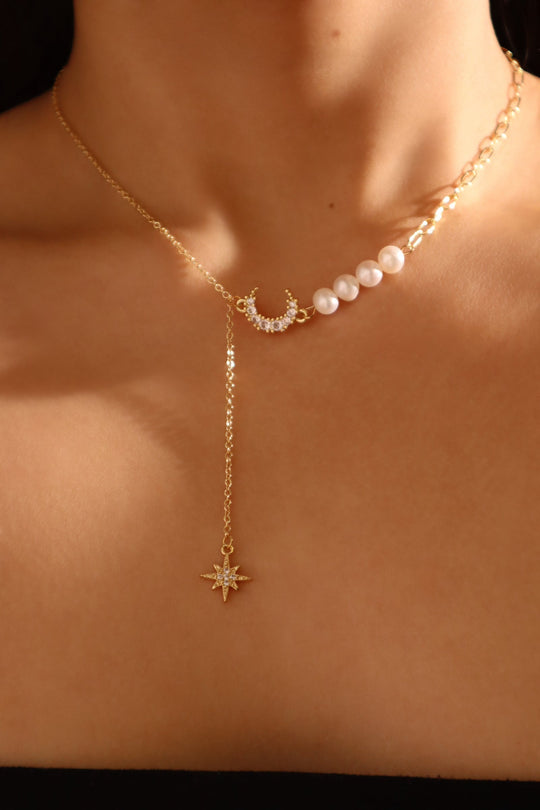 Collana di perle, luna e stella