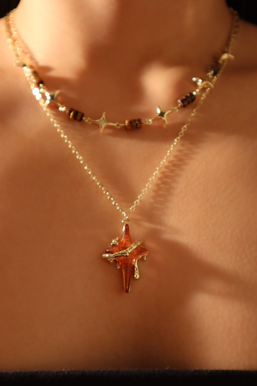Collana con stella marrone Tigerite