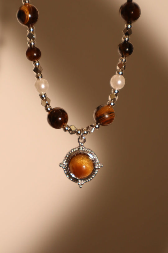 Collana con stella di perle marroni di tigerite