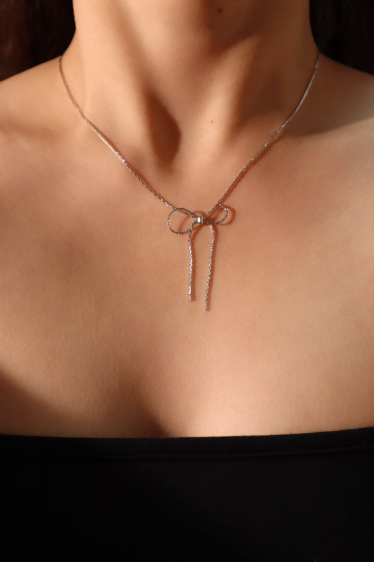 Collana con fiocco in acciaio inossidabile