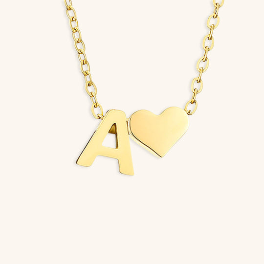 Collana con lettera iniziale Ria in oro