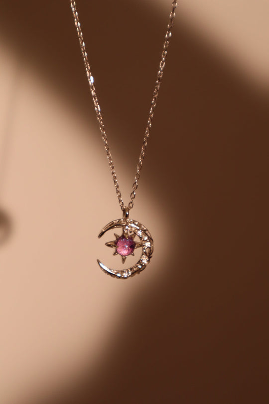 Collana con luna e gemma glitterata viola