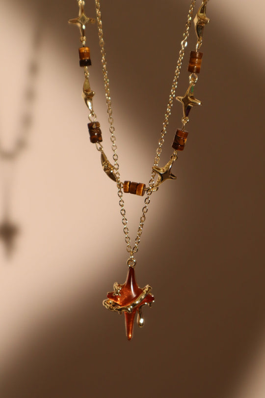 Collana con stella marrone Tigerite