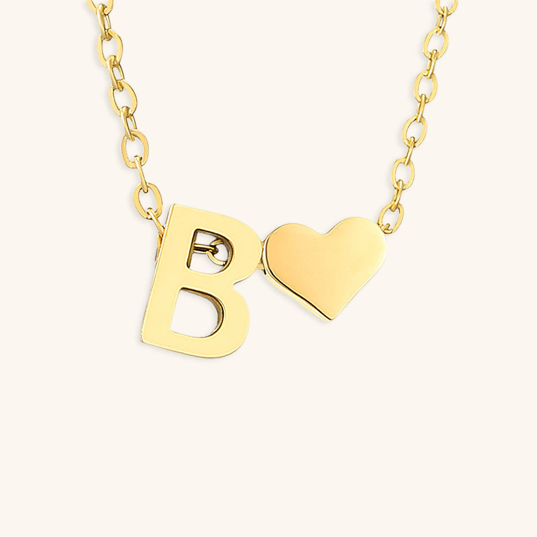 Collana con lettera iniziale Ria in oro