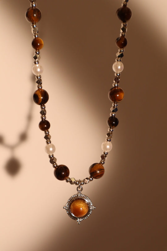 Collana con stella di perle marroni di tigerite