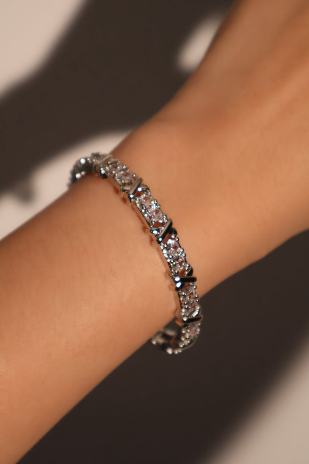 Bracciale con croce di diamanti