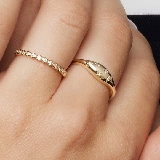 Anello con diamante a cupola