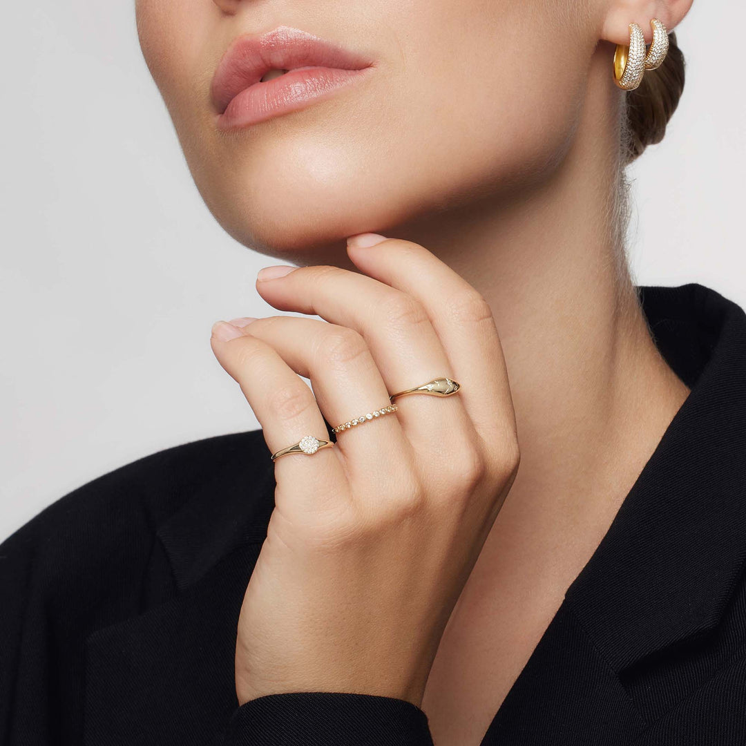 Anello con diamante a cupola