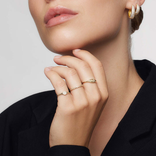Anello con diamante a cupola