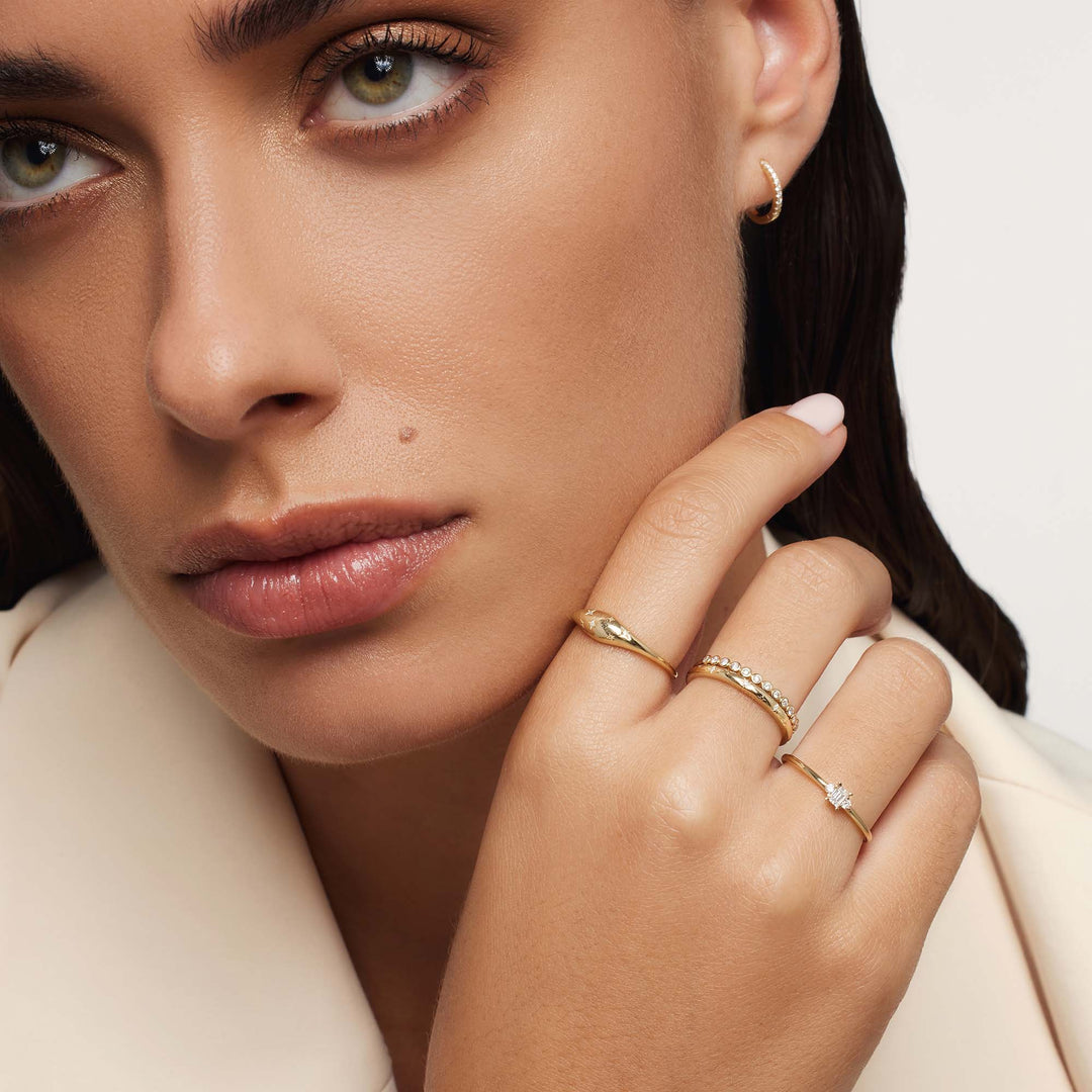 Anello con diamante a cupola