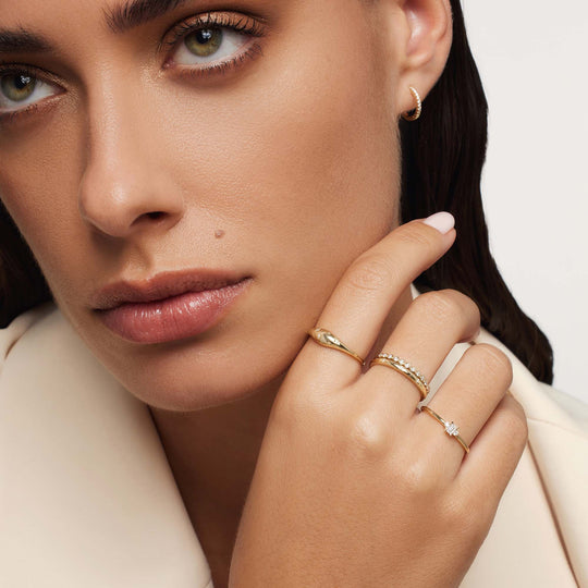 Anello con diamante a cupola