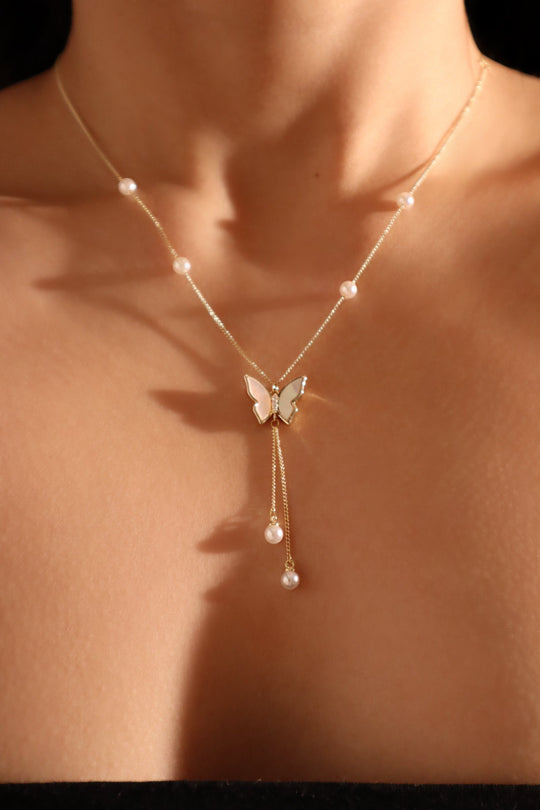 Collana di perle a farfalla