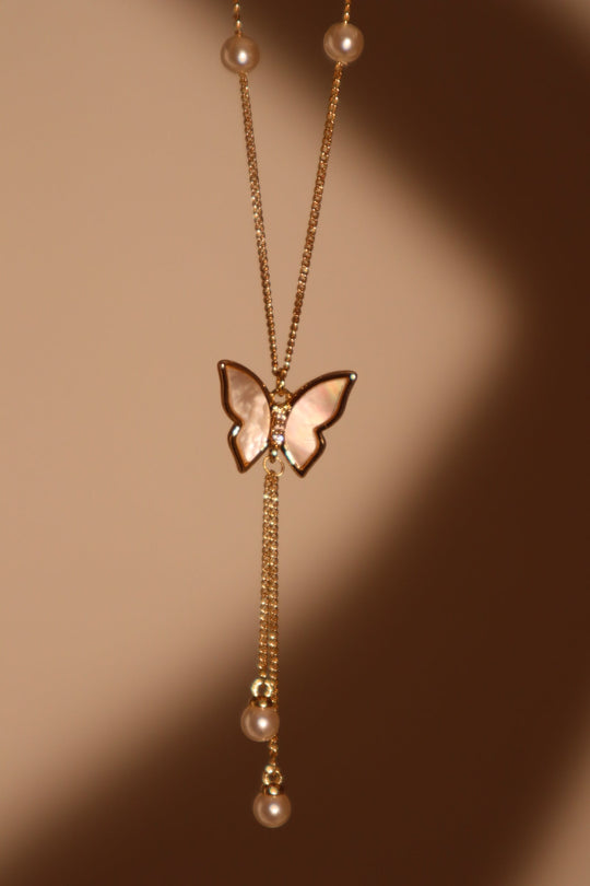 Collana di perle a farfalla