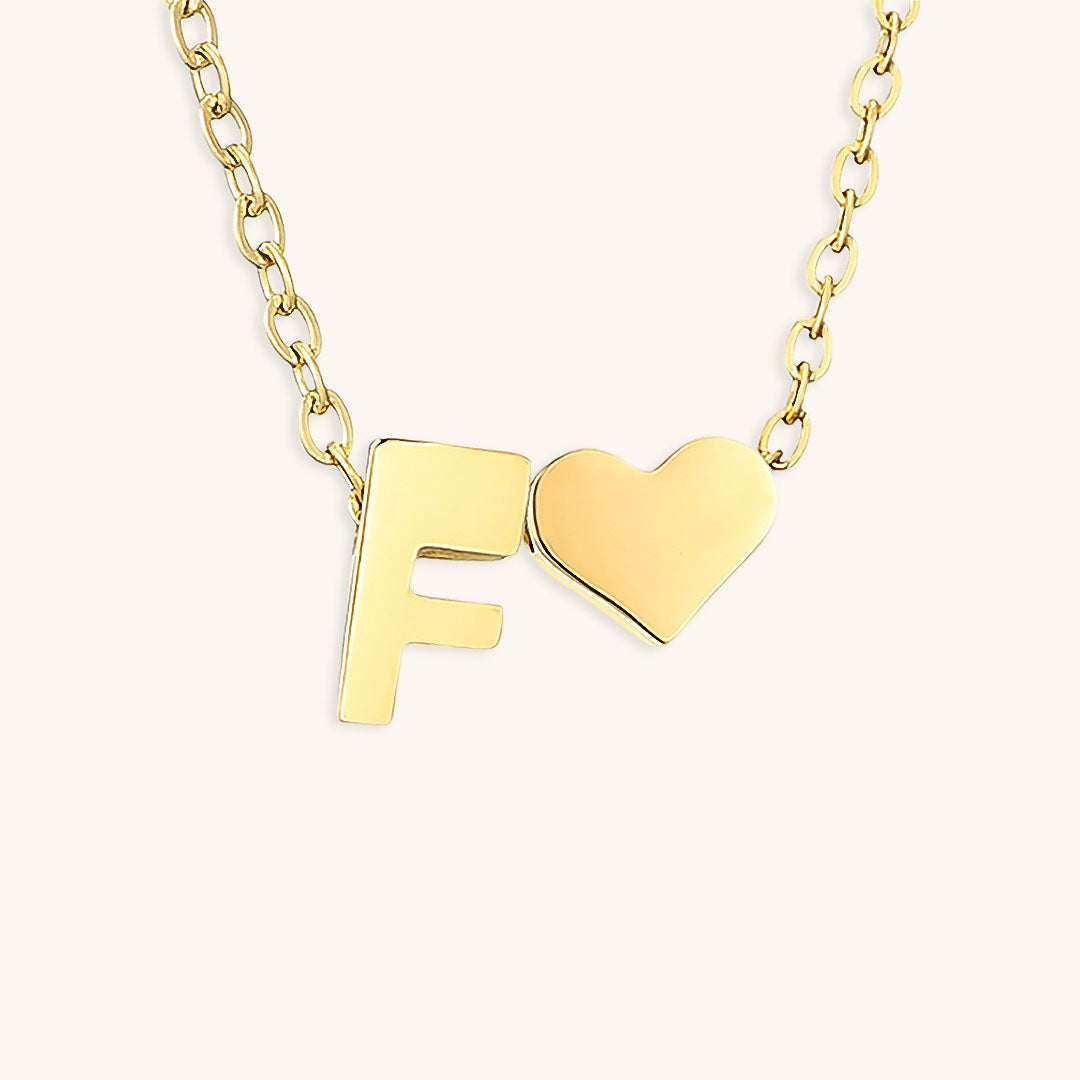 Collana con lettera iniziale Ria in oro