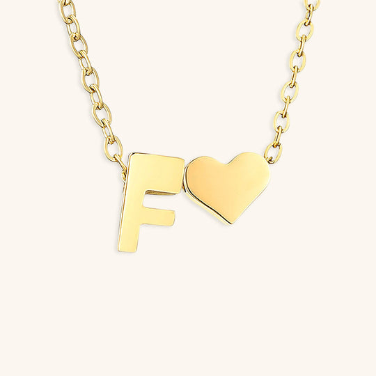 Collana con lettera iniziale Ria in oro