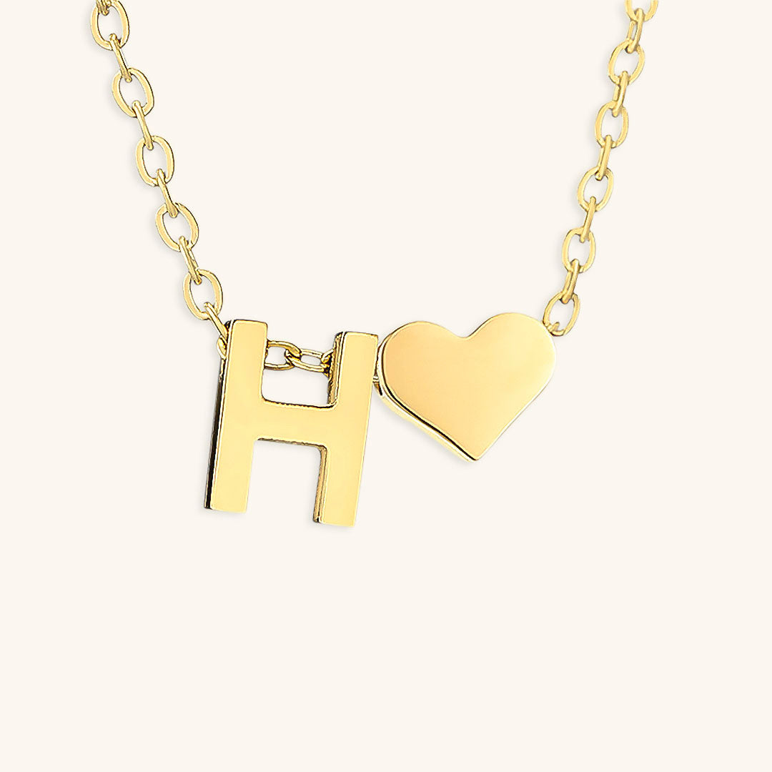 Collana con lettera iniziale Ria in oro