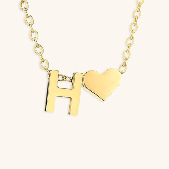 Collana con lettera iniziale Ria in oro