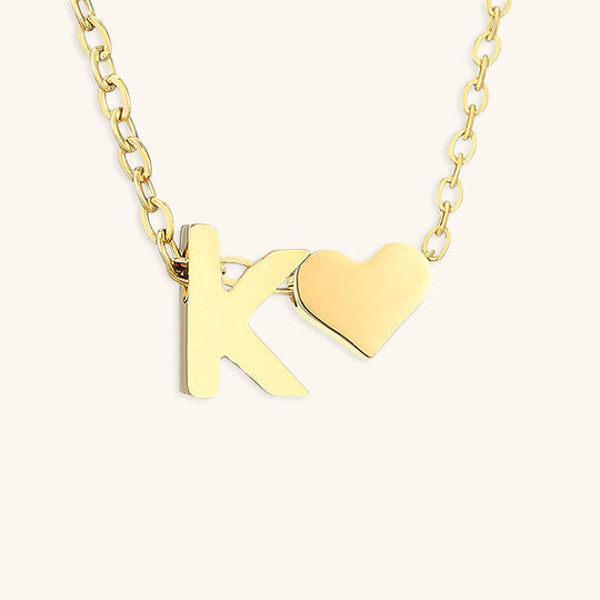 Collana con lettera iniziale Ria in oro