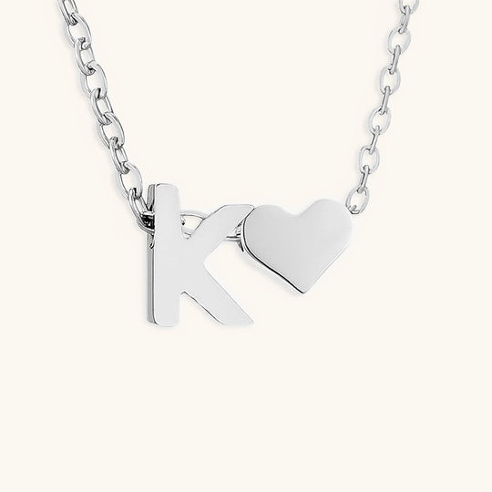 Collana con lettera iniziale Ria in oro