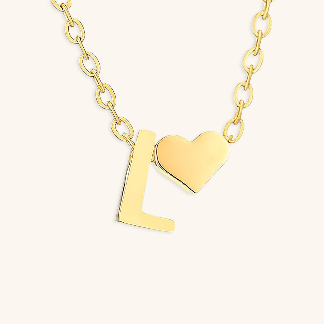 Collana con lettera iniziale Ria in oro