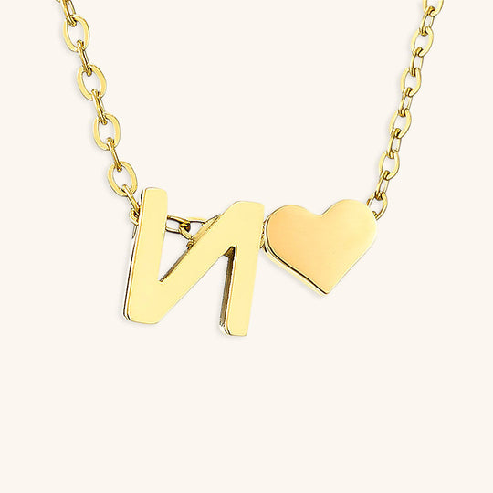 Collana con lettera iniziale Ria in oro