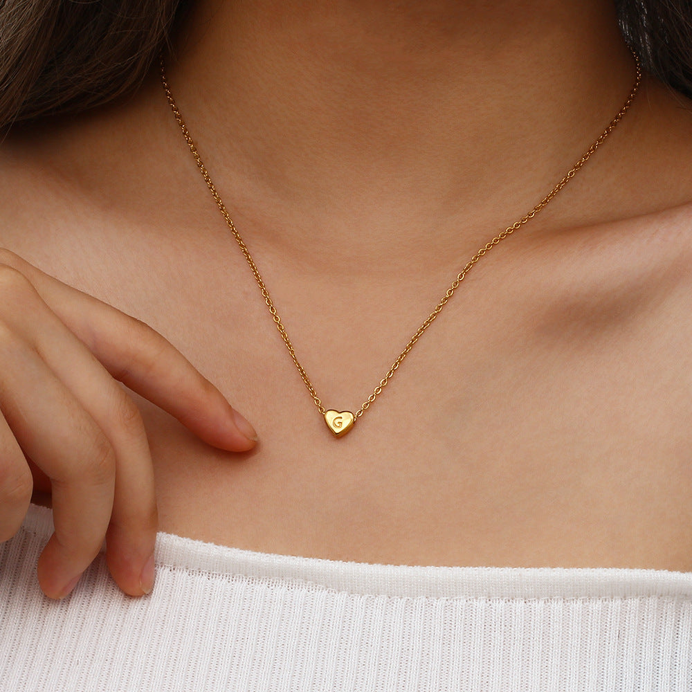 Collana in oro con iniziale a cuore