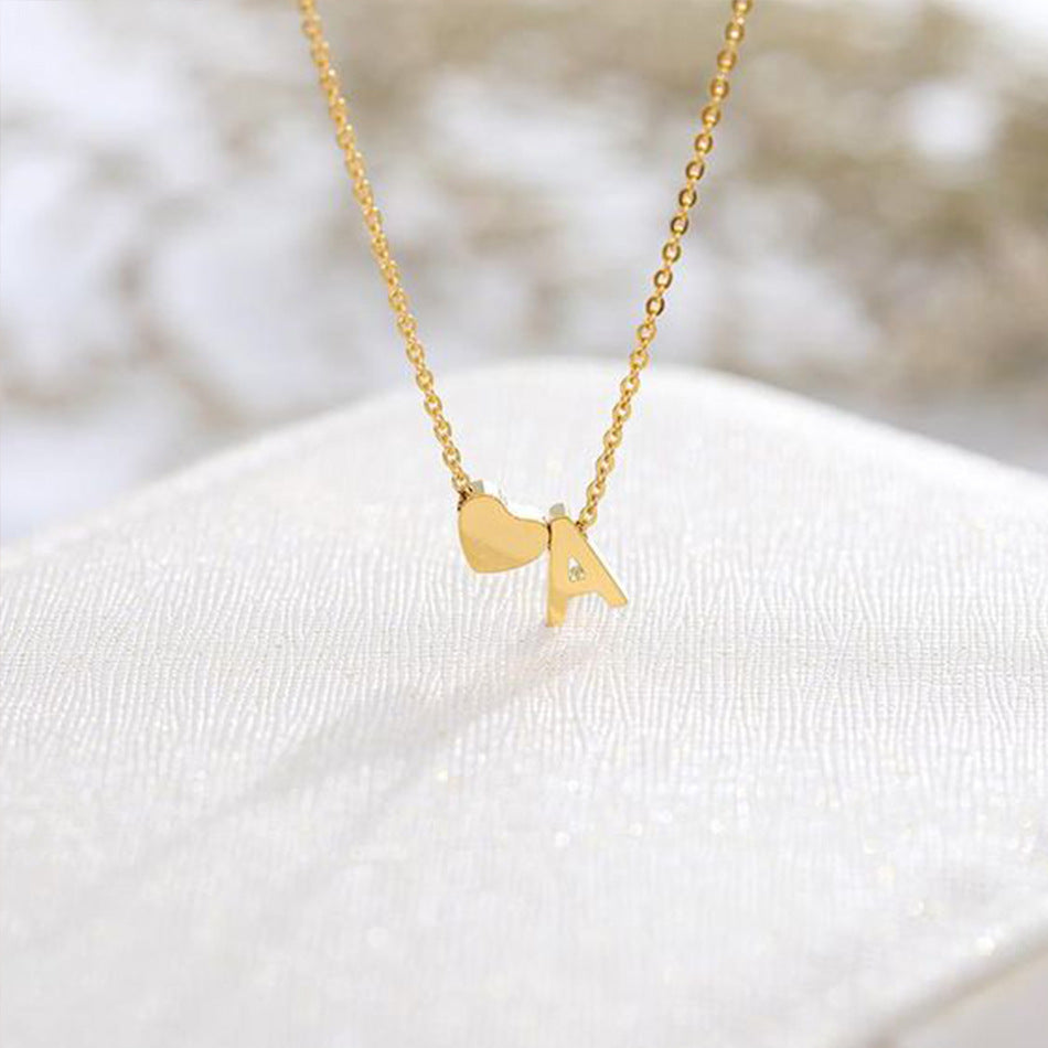 Collana con lettera iniziale Ria in oro