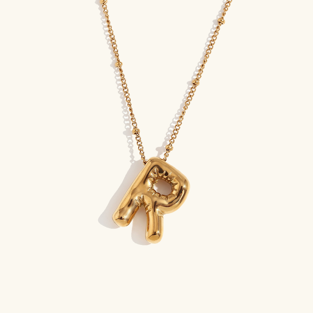 Collana con iniziale in oro a palloncino