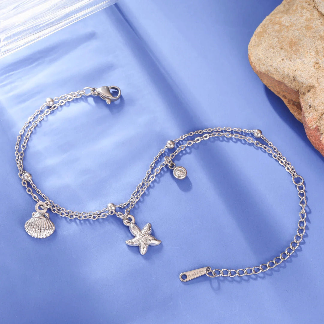 Bracciale da spiaggia con stelle marine e conchiglie