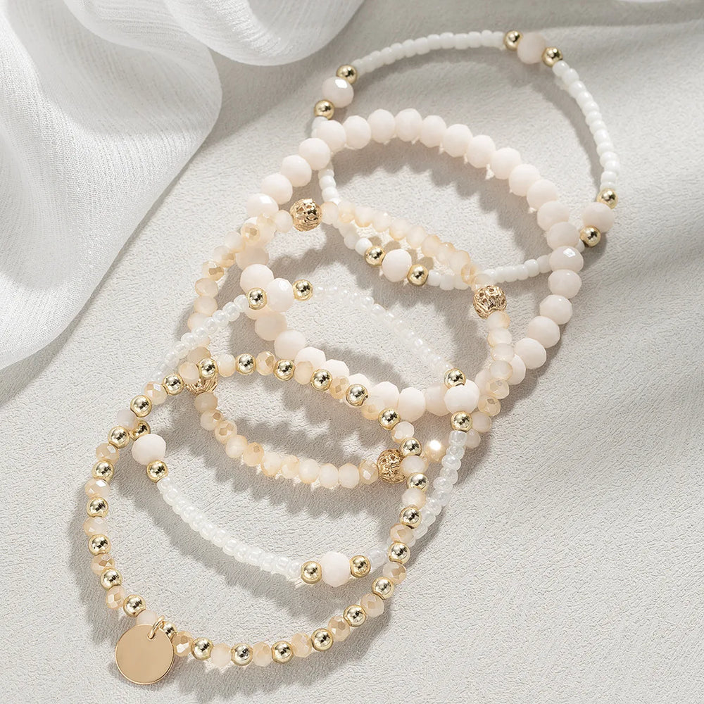 Set di 5 braccialetti con perline in resina per donna