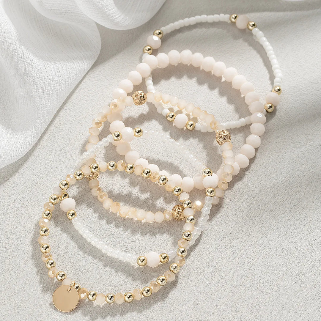 Set di 5 braccialetti con perline in resina per donna