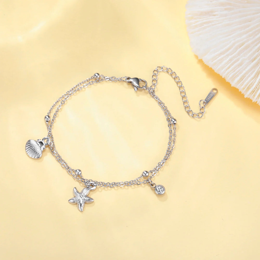 Bracciale da spiaggia con stelle marine e conchiglie