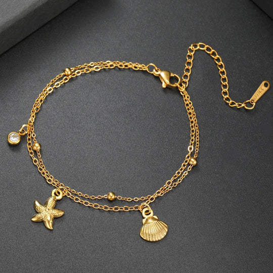Bracciale da spiaggia con stelle marine e conchiglie