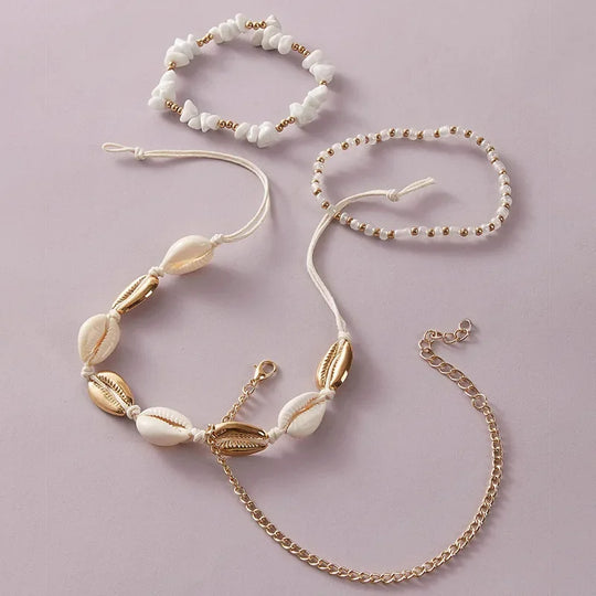 Set di 4 cavigliere con conchiglie e perline