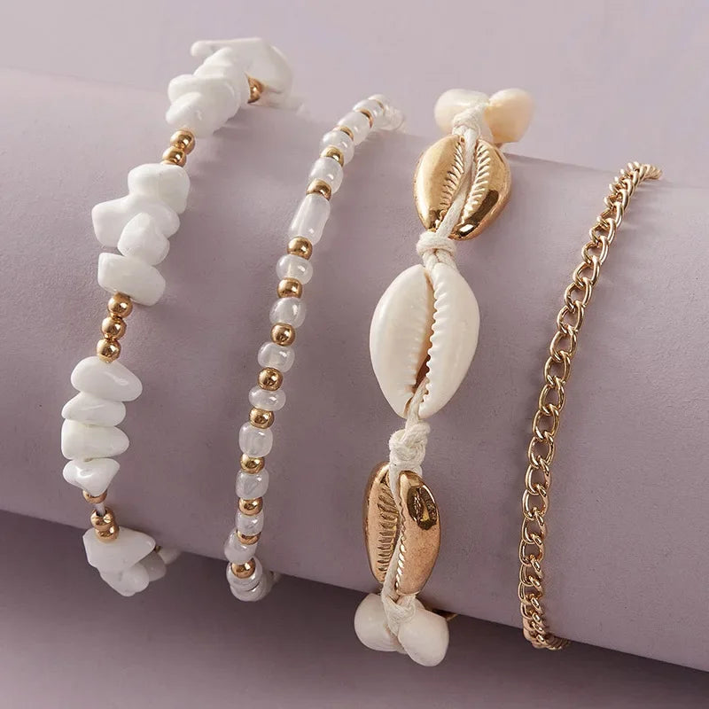 Set di 4 cavigliere con conchiglie e perline