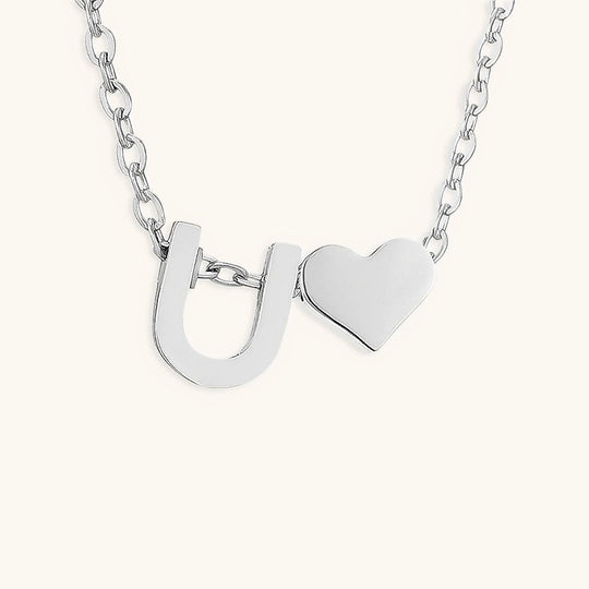 Collana con lettera iniziale Ria in oro
