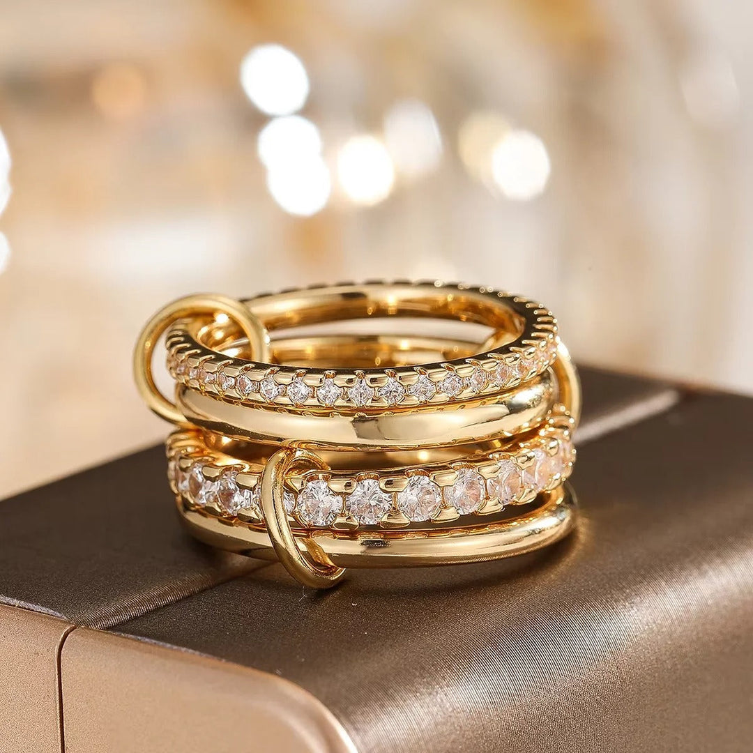 Anello a catena con cristalli in oro e argento