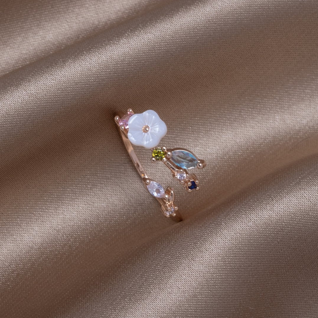 Anelli Crystal White Blossom in oro rosa