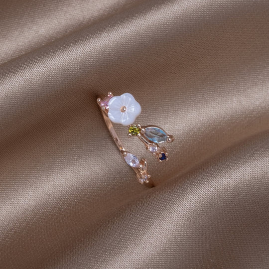 Anelli Crystal White Blossom in oro rosa