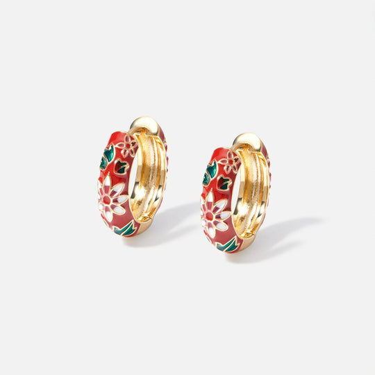 Orecchini a cerchio in oro con fiori