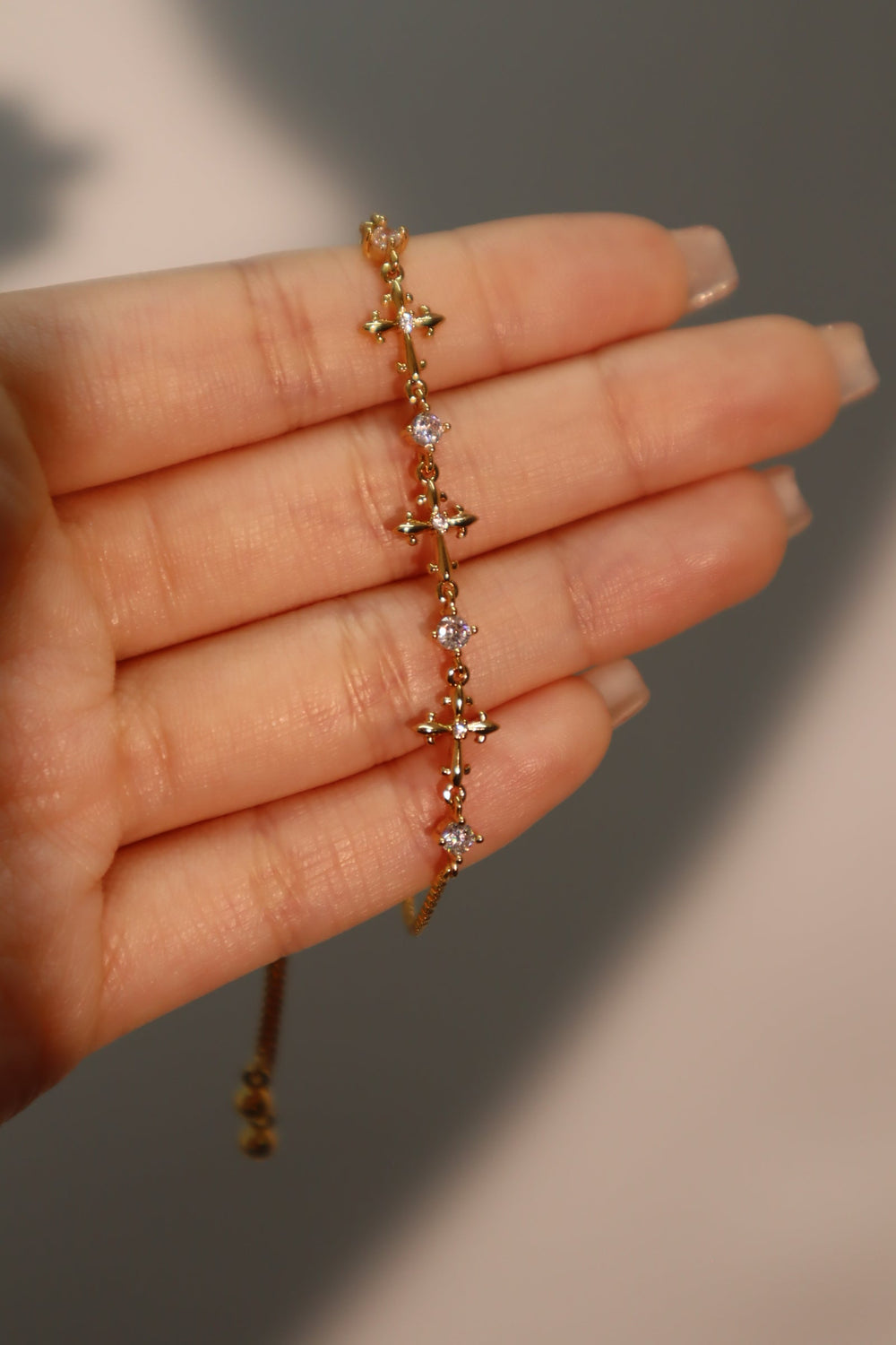 Bracciale con croce multidiamante