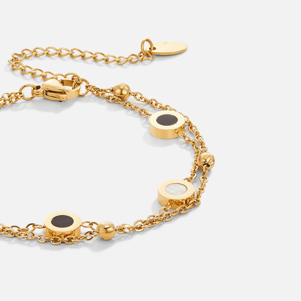 Bracciale in onice e pietra bianca