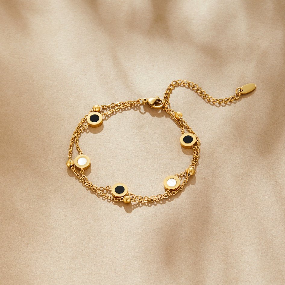 Bracciale in onice e pietra bianca